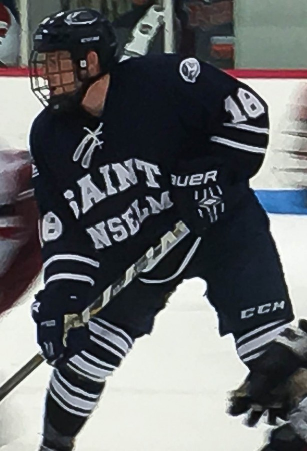 Bryan Green on the ice for St. As against NEC.