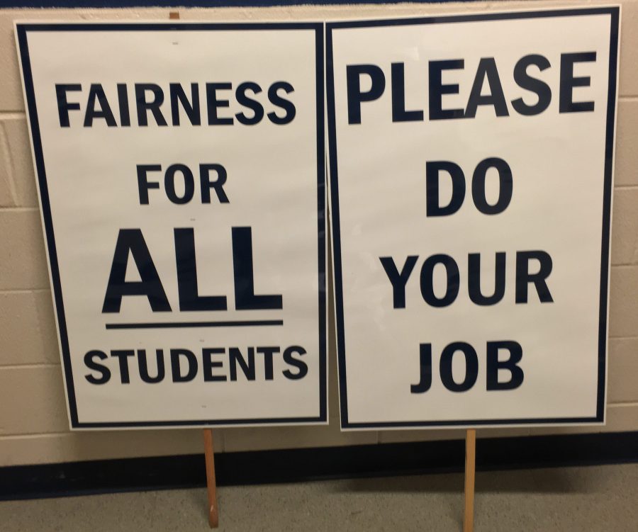 Signs used by St. A’s varsity ice hockey protesters.