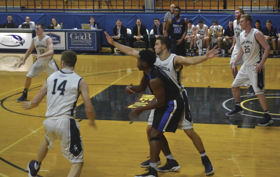 Mens basketball running an offensive play in a victory against Bentley Nov. 30.