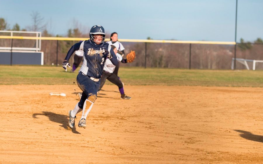 Sophomore Leiandra Wilson looks to round third base and head to home plate.