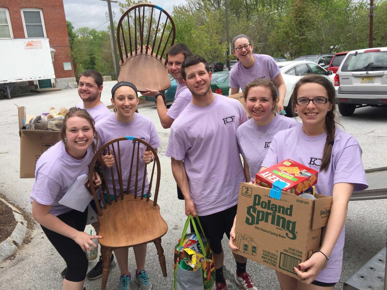 (Left to right): Amy Vachon ’17, Charles Dooley ’16, Madison Vigneault ’18, Josh Post ’16, Paul Trabucco ’16, Amelia Way ’16, Mar-
garet Lynch ’17, and Jessica Gipson ’16 at the 2016 Food, Clothing, & Furniture drive.