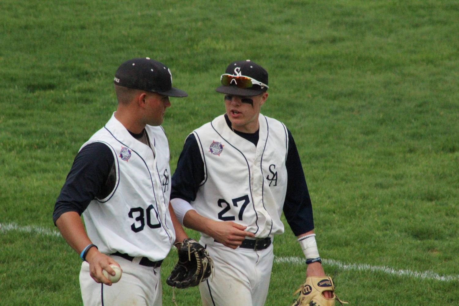 Sophomores Vincent Fortini (left) and Tyler McKeon (right) chatting on the field