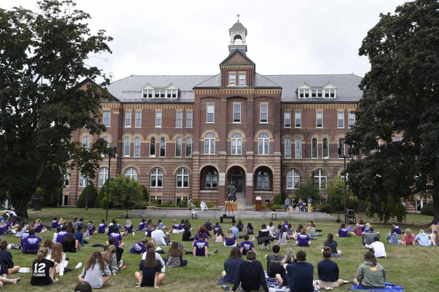 Students gathered during Orientation Week for a socially distanced mass outside of Alumni Hall.