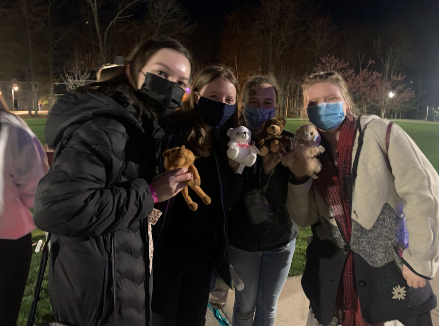 Students wearing masks at socially distanced Spring Weekend 