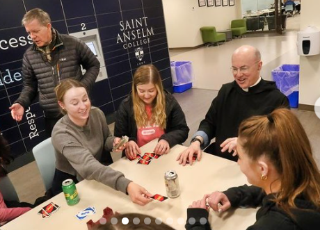 Fr. Augustine plays Pictionary with students at monastic recreation on March 22