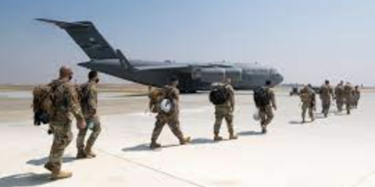 American troops prepare to fly to the MIddle-East to take part in the controversial evacuation of Afghanistan in August of 2021