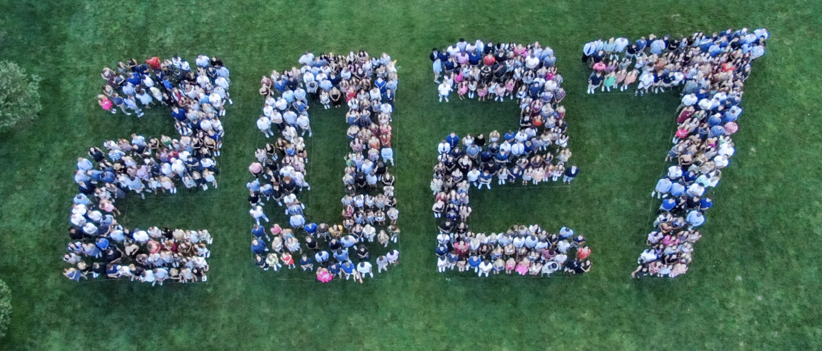 The Class of 2027 takes a drone photo and shows some class/school spirit.