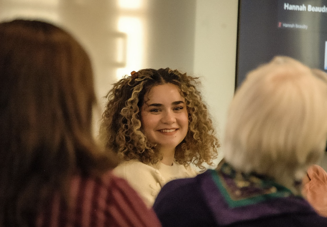 Saylor Garcia ’24, center, led a forum with Jean Couture, director of Student
Engagement and Learning, discussing the past 50 years of SAC women’s leadership.
