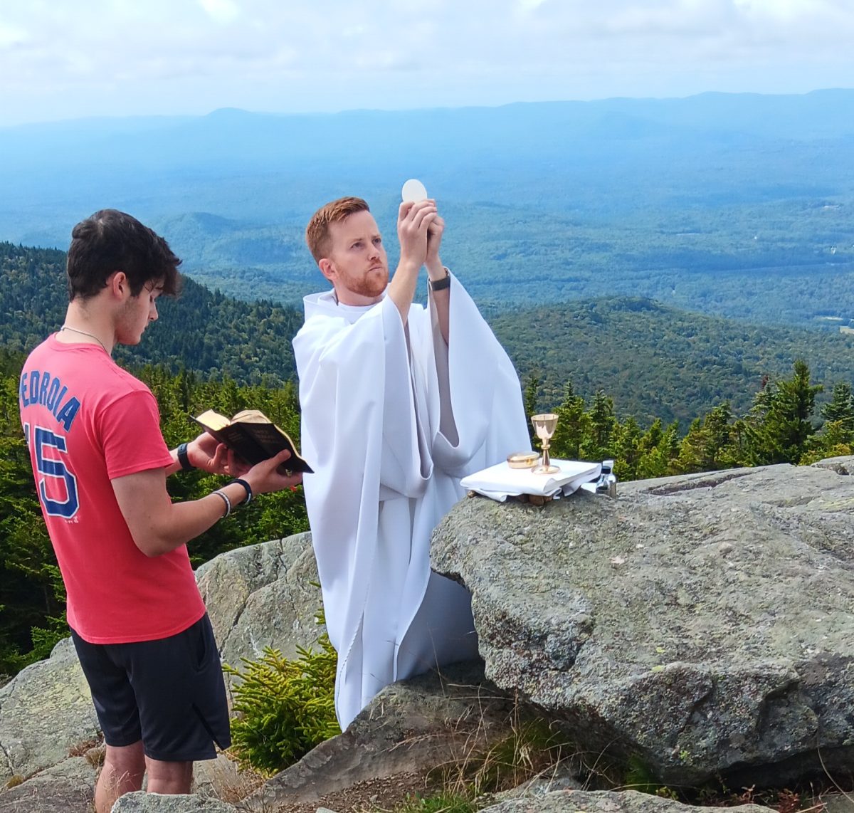 Father Celestine celebrates Mass on top of Mount Kearsarge.