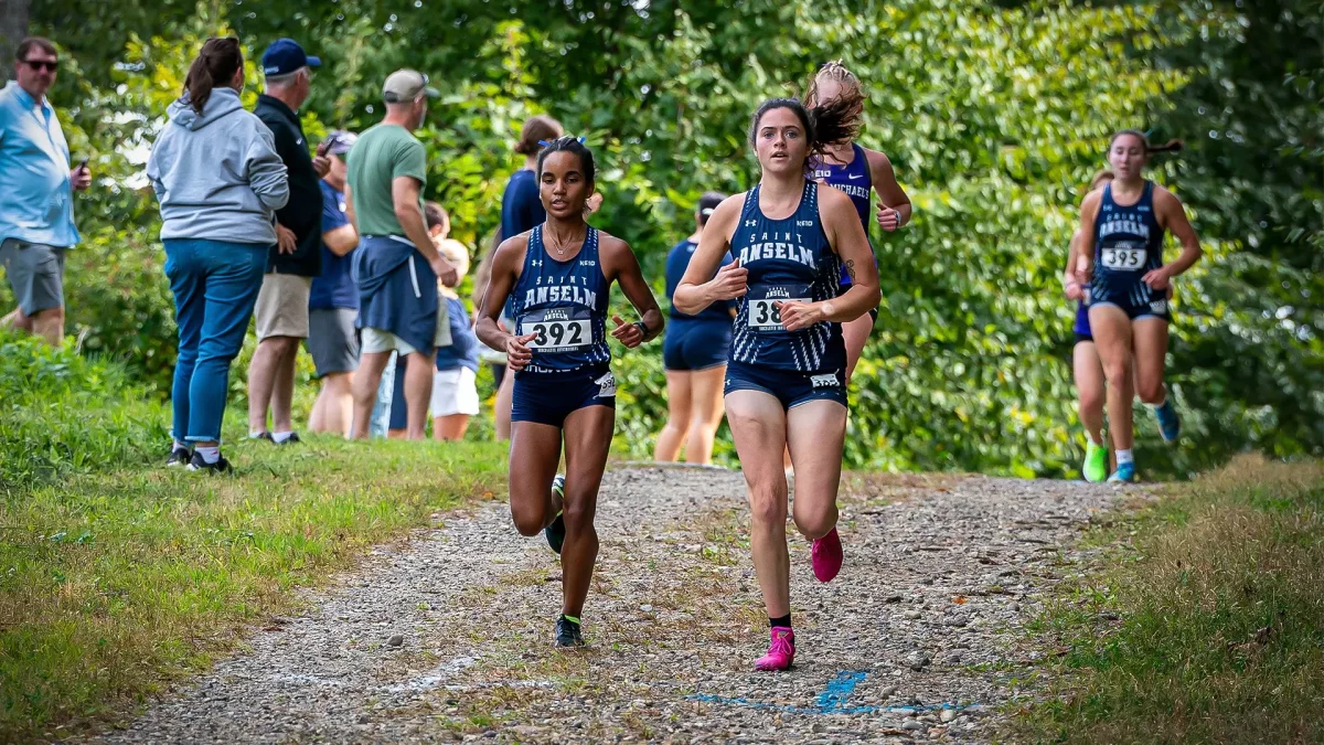  Anyelina Martinez and Nora Conway competing in cross country.