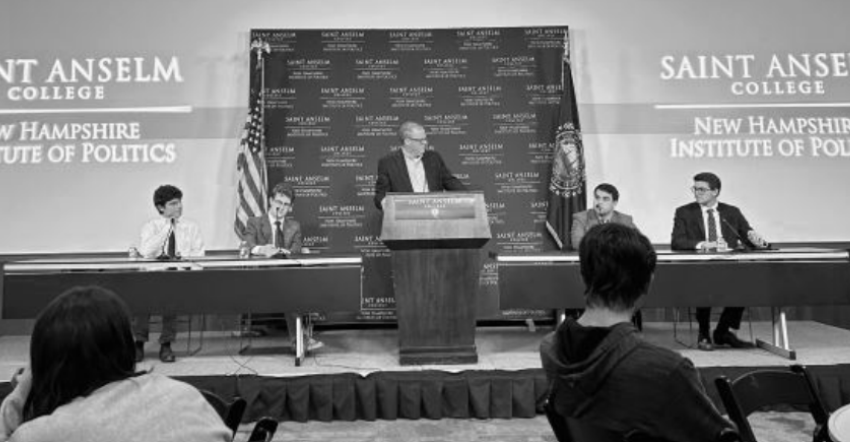 College Democrats (left) debating College Republicans (right) with debate mediation done by NHIOP’s Neil Levesque (center).