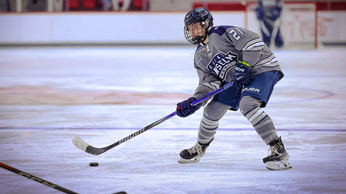  Senior Audrey Jackson ’25 on the ice against Sacred Heart in early January.