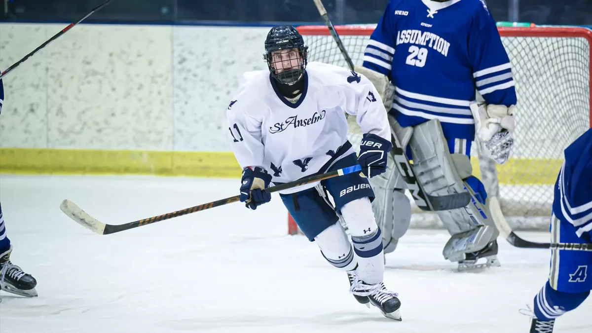  Freshman Conor Kelly skates across the ice in game against Assumption University.