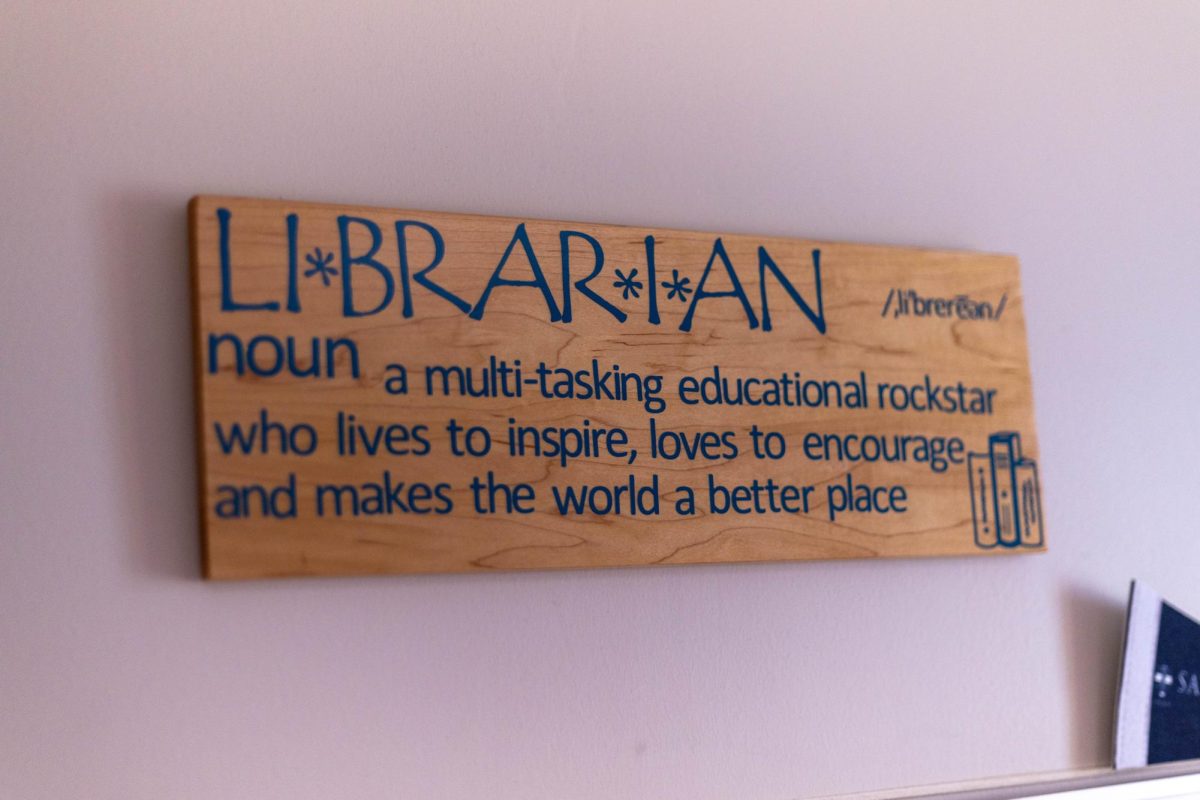 A sign hangs in Geisel librarian Melinda Malik's office.
