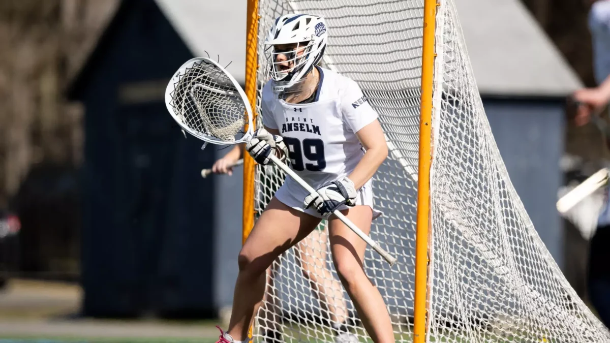 Elizabeth Driscoll ’25 in lacrosse game as main goalie.